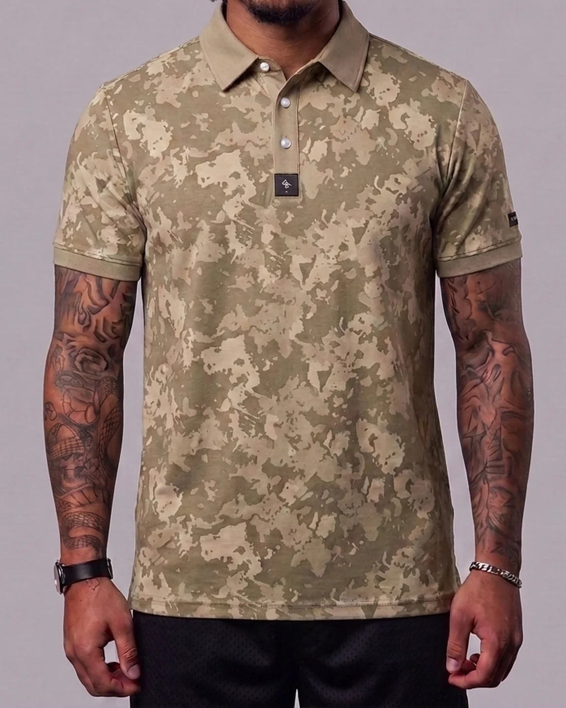 Model wearing the Byrd Gang Obsidian - Beige men’s polo