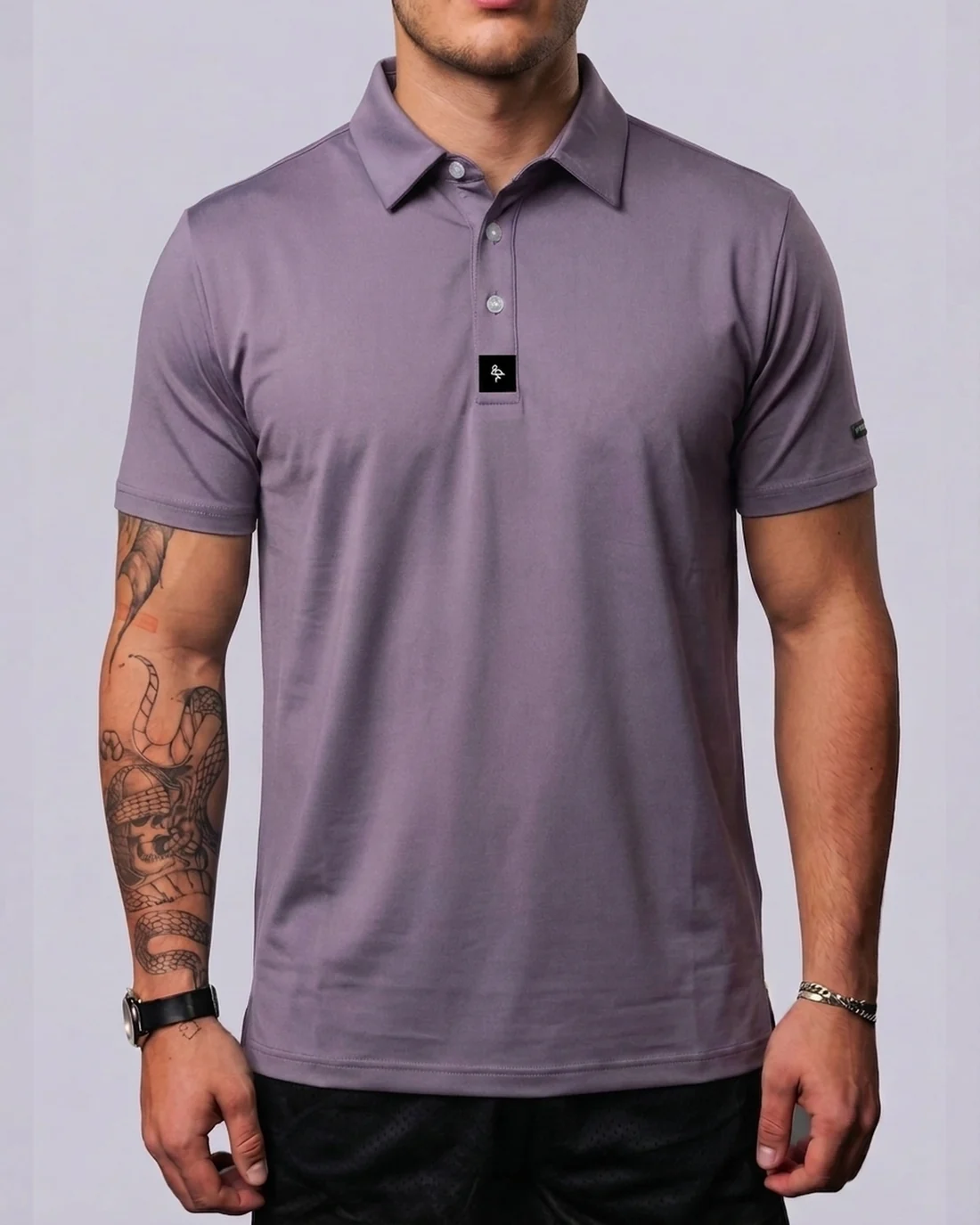 Model wearing the Byrd Gang Lavender men’s polo